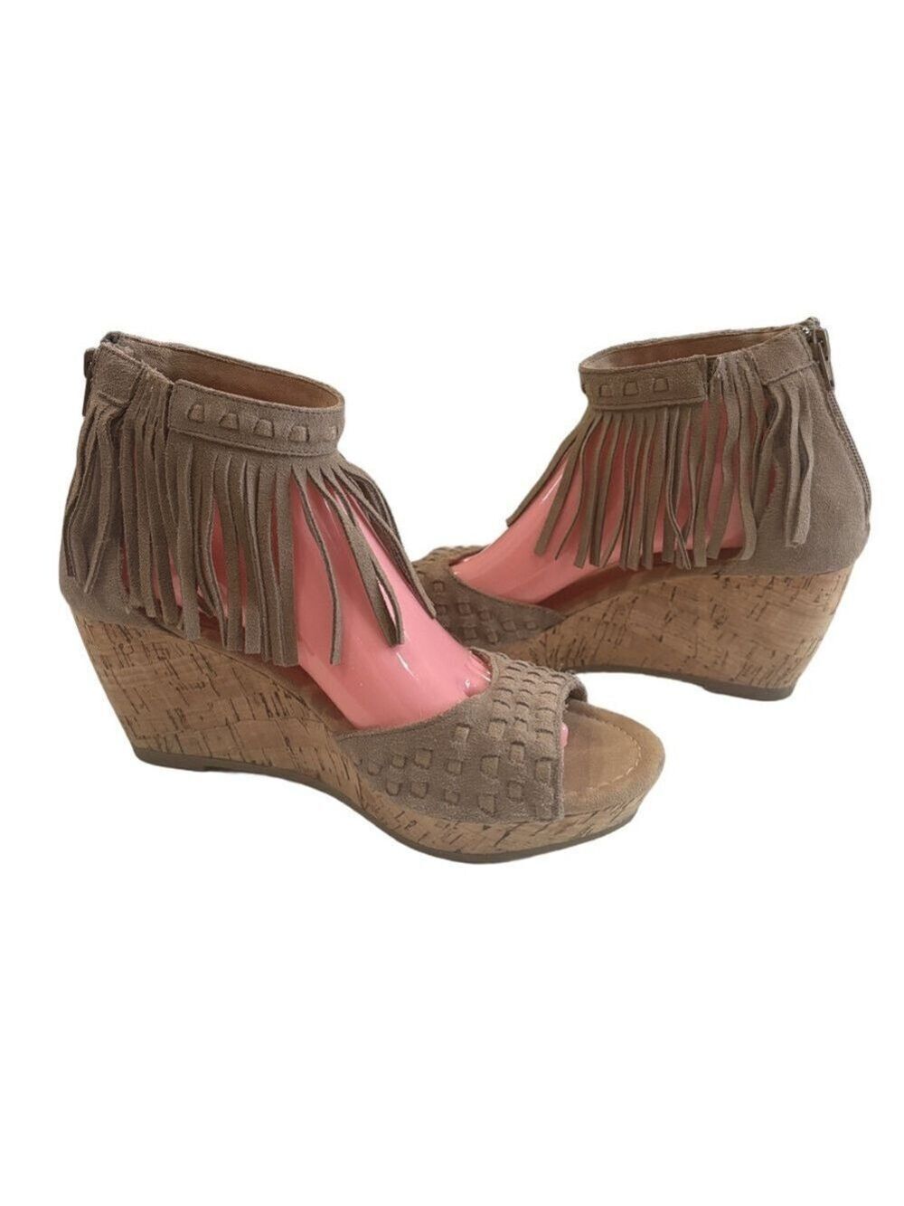 Minnetonka Sz 9 leather wedge heel sandals. Ankle strap with fringe cork heel